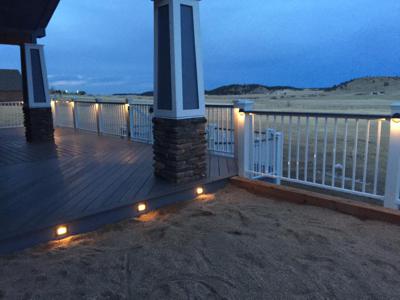 Covered Deck with Accent Lighting by Deck Works in Colorado Springs