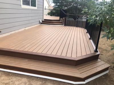 Composite Deck with Iron Rails and Deck Skirt built by Deck Works in Colorado Springs