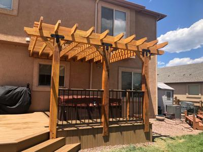 Composite Deck with Pergola & Hot Tub built by Deck Works in Colorado Springs