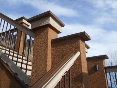 Stucco Deck with Outdoor Living and Decorative Concrete Patio by Deck Works in Colorado Springs