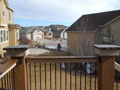 Stucco Deck with Outdoor Living and Decorative Concrete Patio by Deck Works in Colorado Springs