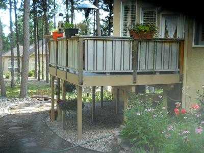 Painted Deck with Privacy Rail by Deck Works in Colorado Springs