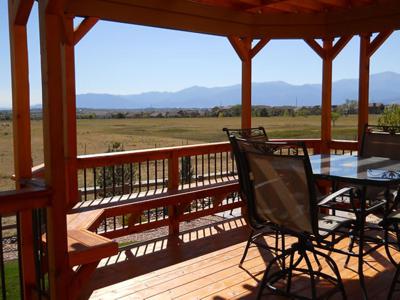 Hardwood Deck with Pergola, Benches & Stairway built by Deck Works in Colorado Springs