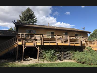 Multi Level Deck with Custom Rail, Benches and Flower Boxes built by Deck Works in Colorado Springs