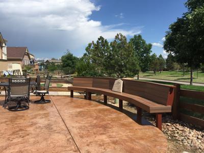 Deck with Pergola, Stairway, Bench & Stamped Concrete Patio by Deck Works in Colorado Springs