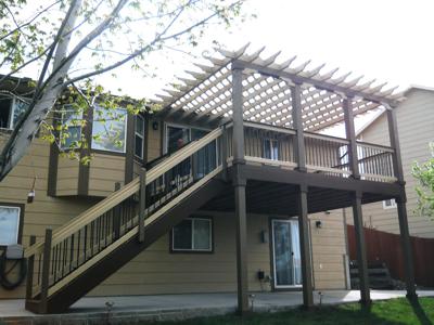 Composite Deck with Pergola, Stairway & Accent Lighting built by Deck Works in Colorado Springs