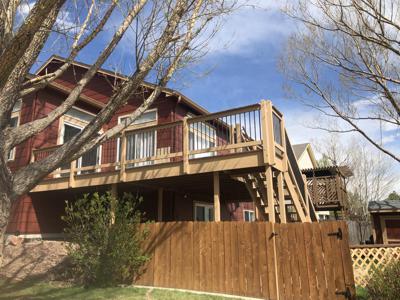 Composite Deck with Custom Rails and Stairway built by Deck Works in Colorado Springs