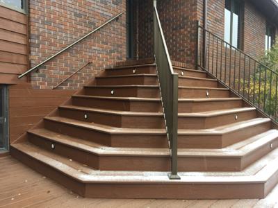 Staircase with Iron Rail & Accent Lighting by Deck Works in Colorado Springs