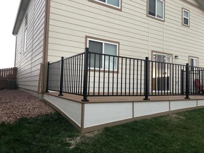 Composite Deck with Iron Rail and Deck Skirt built by Deck Works in Colorado Springs