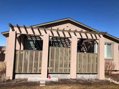 Stucco Deck Cover with Custom Rail built by Deck Works in Colorado Springs