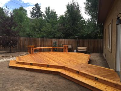 Hardwood Patio with Accent Lighting, Bench and Flowerbox by Deck Works in Colorado Springs