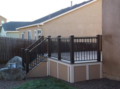 Composite Deck with Stairway, Iron Rail & Accent Lighting by Deck Works in Colorado Springs
