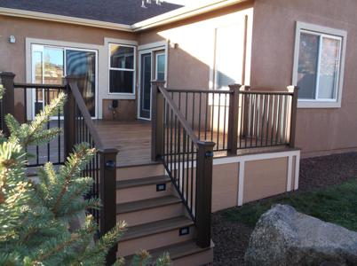 Composite Deck with Stairway, Iron Rail & Accent Lighting by Deck Works in Colorado Springs
