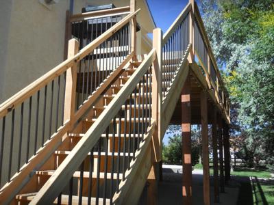 Hardwood Deck with Stairway, Custom Rail & Accent Lighting by Deck Works in Colorado Springs