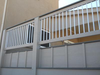 Deck with Cover, Custom Rail, Storage Benches & Accent Lighting by Deck Works in Colorado Springs