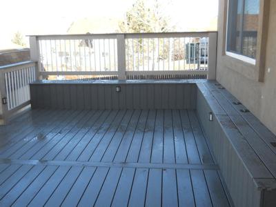 Deck with Cover, Custom Rail, Storage Benches & Accent Lighting by Deck Works in Colorado Springs