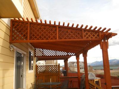 Deck with Custom Rails, Pergola & Accent Lighting by Deck Works in Colorado Springs