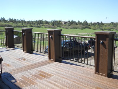 Deck with Iron Rails & Stairway by Deck Works in Colorado Springs