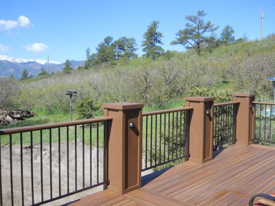 Deck with Iron Rails & Stairway by Deck Works in Colorado Springs