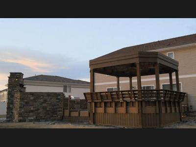 Stone & Composite Patio With Jacuzzi Cover built by Deck Works in Colorado Springs