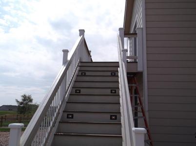 Deck with Stairway, Custom Rail & Accent Lighting built by Deck Works in Colorado Springs
