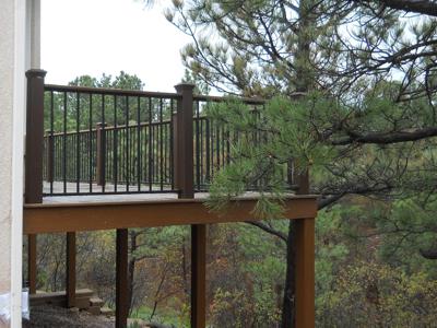 Composite Deck with Iron Rail built by Deck Works in Colorado Springs