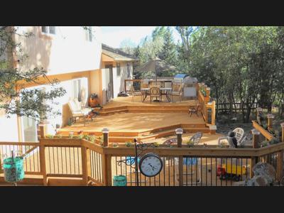 Multi Level Outdoor Living Area with Accent Lighting built by Deck Works in Colorado Springs