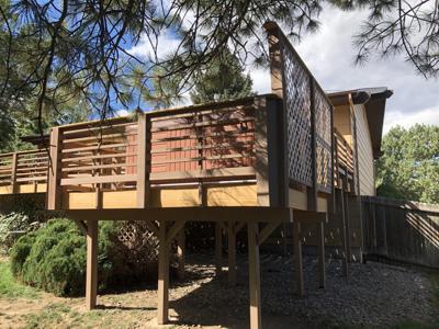 Multi Level Deck with Custom Rail, Benches and Flower Boxes built by Deck Works in Colorado Springs