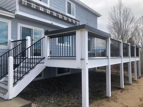 Painted Deck with Iron Rails Built by Deck Works in Colorado Springs