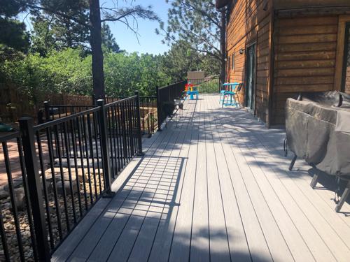 Composited Deck Iron Rail and Dry Below Deck System Built by Deck Works in Colorado Springs